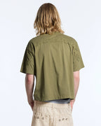 distress curved tee green